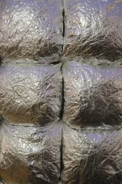 Silver crinkled material texture with distinct segments Stock Photos