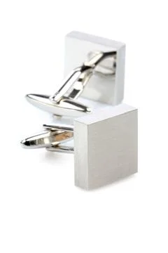 Silver cuff links on white background Stock Photos