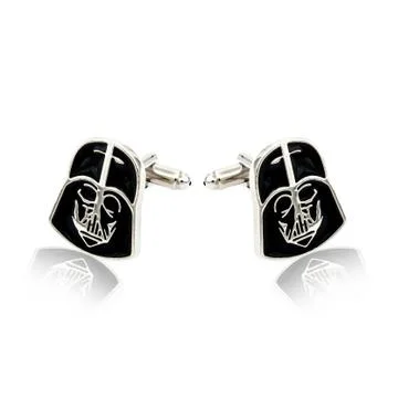 Silver cuff links on white Stock Photos