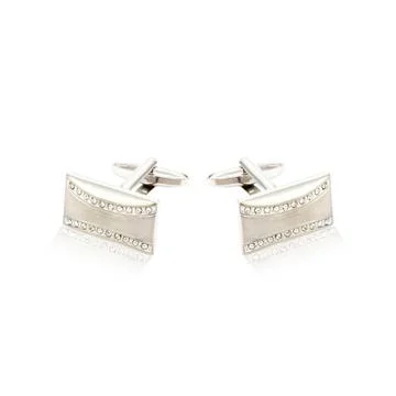 Silver cuff links on white Stock Photos