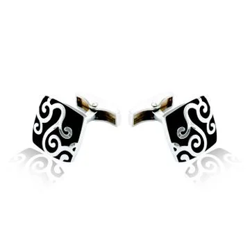 Silver cuff links on white Stock Photos