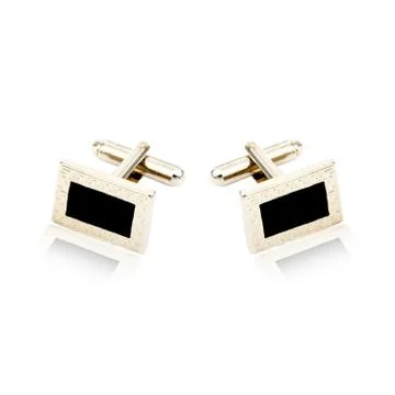 Silver cuff links on white Stock Photos
