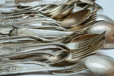Silver cutlery close-up Stock Photos