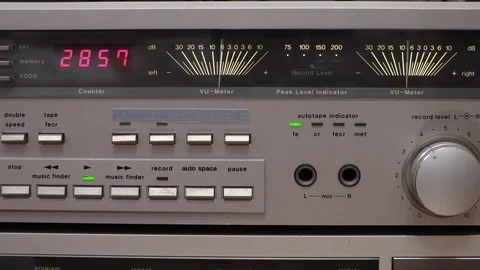 Silver deck recorder with yellow VU meters and red countdown among dials 스톡 동영상 120538207