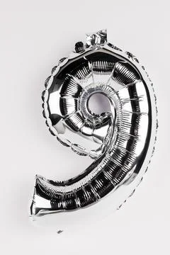 Silver decorative balloon shape nine Stock Photos