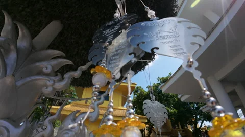 Silver decorative hangings under a structure Stock Footage 310797464