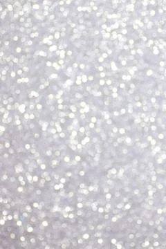 Silver defocused glitter backround. Stock Photos