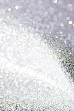 Silver defocused glitter backround. Stock Photos