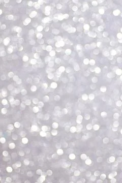 Silver defocused glitter backround. Stock Photos