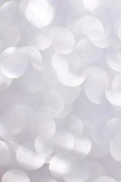Silver defocused glitter backround. Stock Photos
