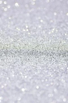 Silver defocused glitter backround. Stock Photos
