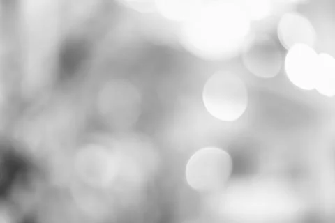 Silver defocused Lights on grey background for Christmas holiday seasonal wal Stock Photos