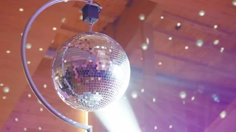 Silver Disco ball under the ceiling in the restaurant Stock Footage 146243226