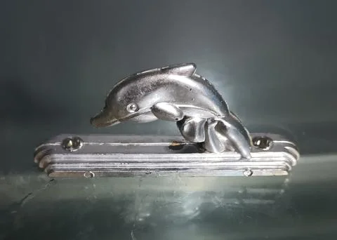 Silver Dolphin Hook Stock Photos