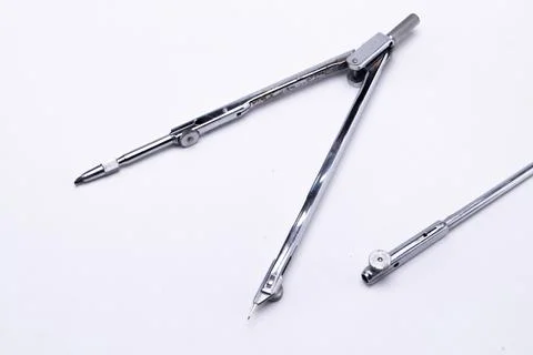 Silver Drawing Compass on White Background, Precision Tool for Geometry and.. Stock Photos