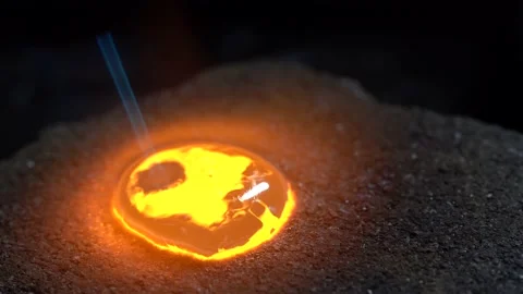 Silver drop melted with gas burner in jewelry workshop. Close up Stock Footage 145394268