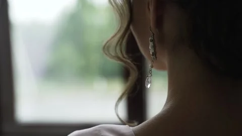 Silver earring with diamond Stock Footage 148074793