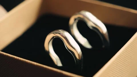 Silver earrings in a gift box. Handcrafted jewelry concept. Stock Footage 319376374