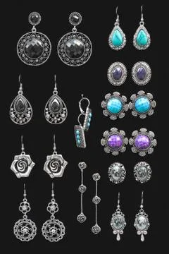Silver earrings Stock Photos