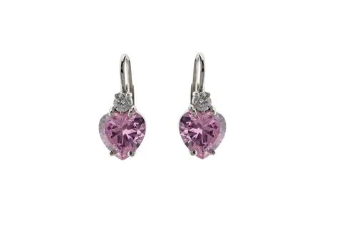 Silver earrings in the shape of heart Stock Photos