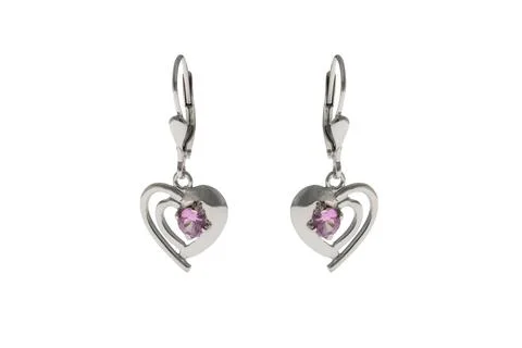 Silver earrings in the shape of heart Stock Photos