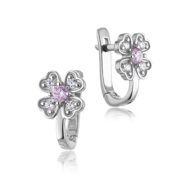 Silver earrings on a white background Stock Photos