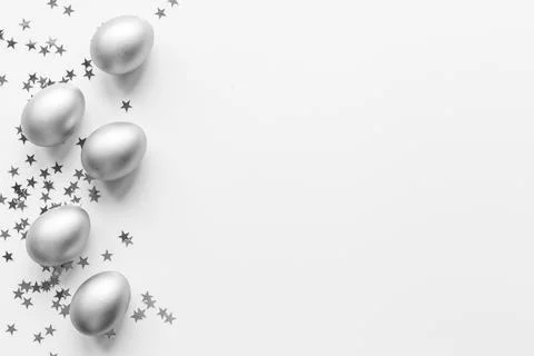 Silver Easter eggs with decoration. Wealth and good luck concept. Stock Photos