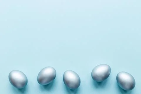 Silver Easter eggs. Easter decoration, top view Stock Photos