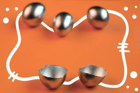 Silver eggs and shells on colored background Foto stock