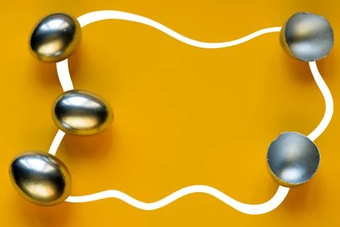 Silver eggs and shells on colored background Foto stock