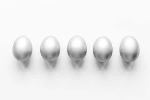 Silver eggs isolated on white background. Easter decoration background. Top view 스톡 사진