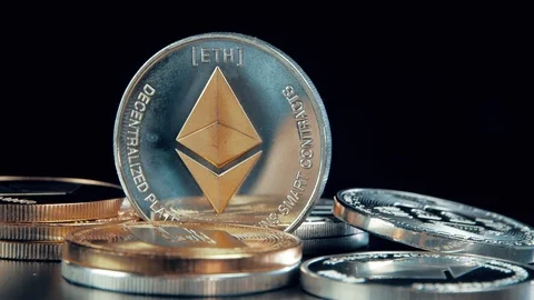 SIlver Ethereum coin on black background. Silver Crypto coin on spinning stand. Stock Footage 126905656