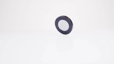 Silver eye shadows rotate on a white background Stockbeeldmateriaal 163523527