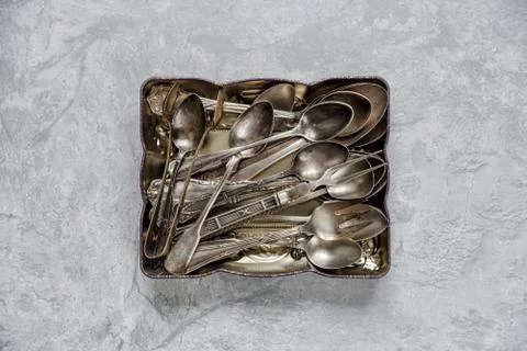 Silver flatware in a metal tray Stock-Fotos