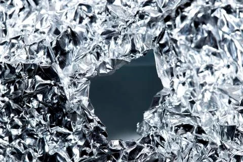 Silver foil as a background Stock Photos
