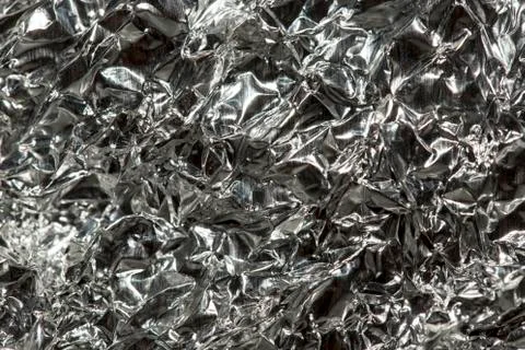 Silver foil as a background Stock Photos