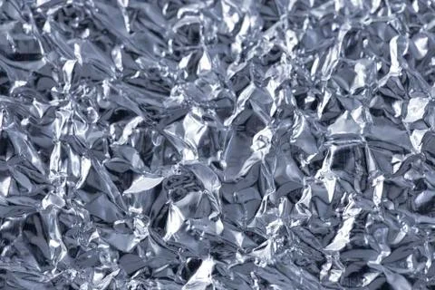Silver foil as a background Stock Photos