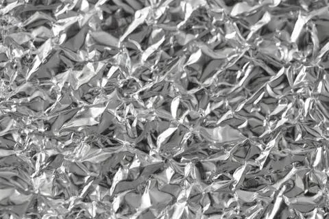 Silver foil as a background Stock Photos