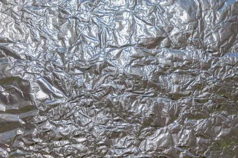 Silver foil background with shiny mint surface for texture background Stock Photos