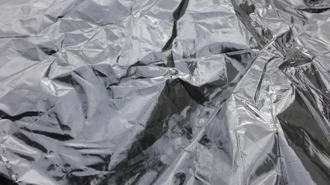 Silver foil rustles in the wind. Stock Footage 115589487