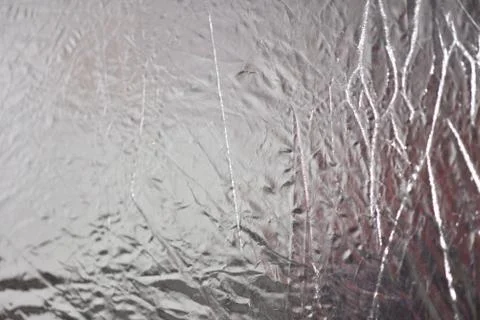 Silver foil shiny metallic texture background wrapping paper for Christmas an Stock Photos