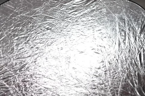 Silver foil shiny metallic texture background wrapping paper for Christmas an Stock Photos