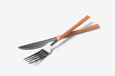 Silver fork and knife on grey background Stock Photos