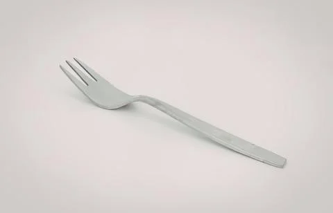 Silver fork on clean background Stock Photos
