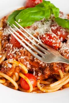 Silver fork on spaghetti bolognese Stock Photos