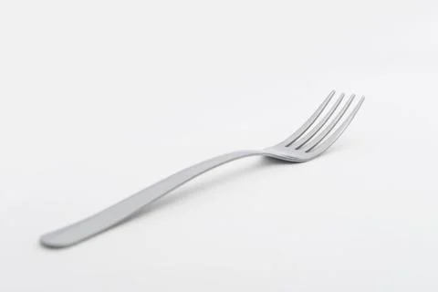 Silver fork on white background Stock Photos