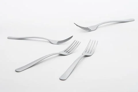 Silver fork on white background Stock Photos