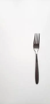 Silver fork on white background Stock Photos