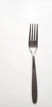 Silver fork on white background Stock Photos