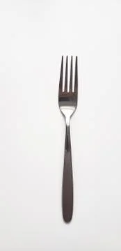 Silver fork on white background Stock Photos